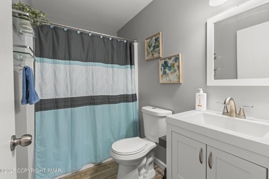 Tucked beneath a canopy of whispering trees, this modern chalet on Pocono Farms Country Club in Pennsylvania - for sale on GolfHomes.com, golf home, golf lot