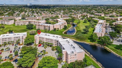 Largest corner penthouse in the Island of Sunrise on Sunrise Lakes Phase IV Golf Course in Florida - for sale on GolfHomes.com, golf home, golf lot