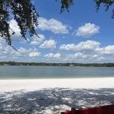 Don't miss this very private .38/acre lot in Sunny Hills to on Sunny Hills Golf and Country Club in Florida - for sale on GolfHomes.com, golf home, golf lot