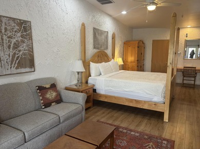 Turnkey, fully furnished retreat in the heart of St on Sunbrook Golf Course in Utah - for sale on GolfHomes.com, golf home, golf lot