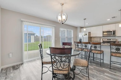 Beautiful corner lot home in Lynn Haven with detached on Panama Country Club in Florida - for sale on GolfHomes.com, golf home, golf lot