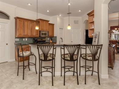 This description paints a vivid picture of the resort-like on Venetian Golf and River Club in Florida - for sale on GolfHomes.com, golf home, golf lot