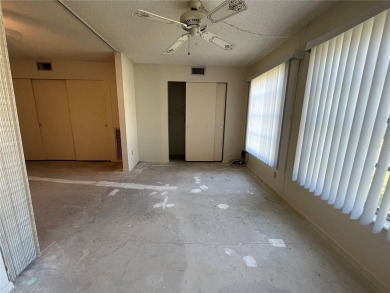 Welcome to this 1 bed 1 bath condo footsteps away from East on On Top Of The World Golf Course in Florida - for sale on GolfHomes.com, golf home, golf lot
