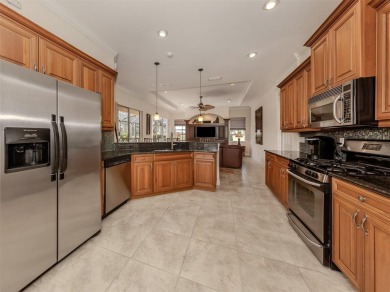 This description paints a vivid picture of the resort-like on Venetian Golf and River Club in Florida - for sale on GolfHomes.com, golf home, golf lot