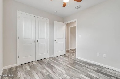 Beautiful corner lot home in Lynn Haven with detached on Panama Country Club in Florida - for sale on GolfHomes.com, golf home, golf lot