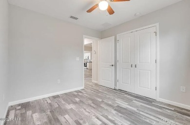 Beautiful corner lot home in Lynn Haven with detached on Panama Country Club in Florida - for sale on GolfHomes.com, golf home, golf lot