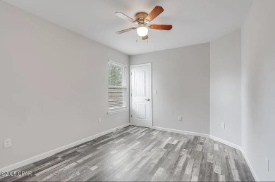 Beautiful corner lot home in Lynn Haven with detached on Panama Country Club in Florida - for sale on GolfHomes.com, golf home, golf lot