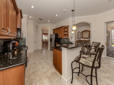 This description paints a vivid picture of the resort-like on Venetian Golf and River Club in Florida - for sale on GolfHomes.com, golf home, golf lot