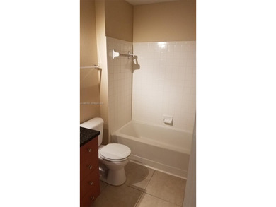 Excellent investment or end-user opportunity! Spacious 2-bedroom on The Carolina Club in Florida - for sale on GolfHomes.com, golf home, golf lot