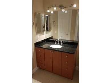 Excellent investment or end-user opportunity! Spacious 2-bedroom on The Carolina Club in Florida - for sale on GolfHomes.com, golf home, golf lot