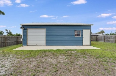 Beautiful corner lot home in Lynn Haven with detached on Panama Country Club in Florida - for sale on GolfHomes.com, golf home, golf lot