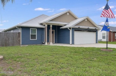 Beautiful corner lot home in Lynn Haven with detached on Panama Country Club in Florida - for sale on GolfHomes.com, golf home, golf lot