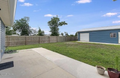 Beautiful corner lot home in Lynn Haven with detached on Panama Country Club in Florida - for sale on GolfHomes.com, golf home, golf lot