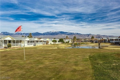 Located in the Desert Greens 55+ community, this home has much on Desert Greens Golf Course in Nevada - for sale on GolfHomes.com, golf home, golf lot