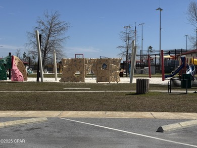 Beautiful corner lot home in Lynn Haven with detached on Panama Country Club in Florida - for sale on GolfHomes.com, golf home, golf lot