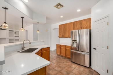 Welcome to this stunning 4-bed, 3-bath home in a gated on Palm Valley Golf Club  in Arizona - for sale on GolfHomes.com, golf home, golf lot