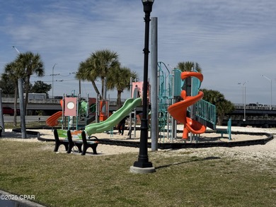 Beautiful corner lot home in Lynn Haven with detached on Panama Country Club in Florida - for sale on GolfHomes.com, golf home, golf lot