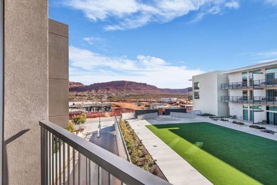 Enjoy the view of the Red Rocks in this end unit, paired with a on Entrada at Snow Canyon in Utah - for sale on GolfHomes.com, golf home, golf lot