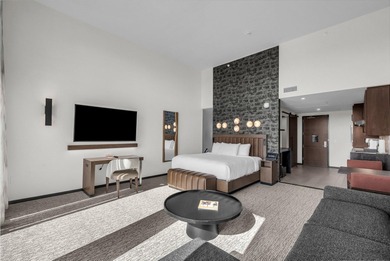 Enjoy incredible views of the lava fields and Hole 9 at Black on Entrada at Snow Canyon in Utah - for sale on GolfHomes.com, golf home, golf lot