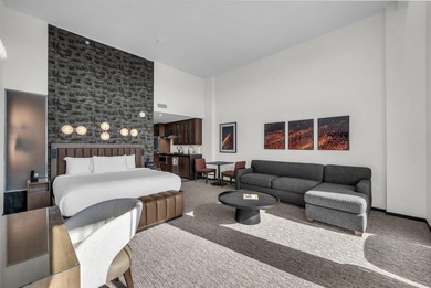 Enjoy incredible views of the lava fields and Hole 9 at Black on Entrada at Snow Canyon in Utah - for sale on GolfHomes.com, golf home, golf lot