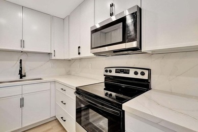 Discover the ultimate in luxury living at 802 Burgundy Q, a on Kings Point Golf -Flanders Way in Florida - for sale on GolfHomes.com, golf home, golf lot