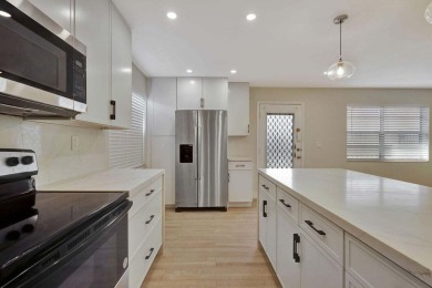 Discover the ultimate in luxury living at 802 Burgundy Q, a on Kings Point Golf -Flanders Way in Florida - for sale on GolfHomes.com, golf home, golf lot