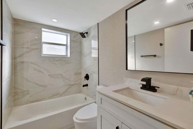 Discover the ultimate in luxury living at 802 Burgundy Q, a on Kings Point Golf -Flanders Way in Florida - for sale on GolfHomes.com, golf home, golf lot