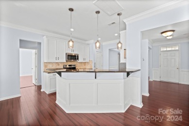 Charming home with 4 bedrooms, 2.5 baths with flex room and a on Highland Creek Golf Club in North Carolina - for sale on GolfHomes.com, golf home, golf lot