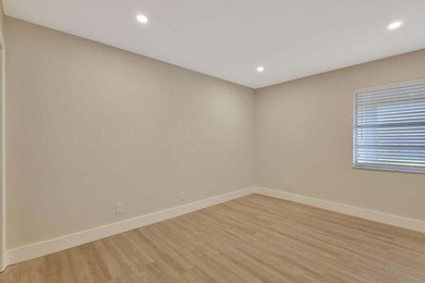 Discover the ultimate in luxury living at 802 Burgundy Q, a on Kings Point Golf -Flanders Way in Florida - for sale on GolfHomes.com, golf home, golf lot