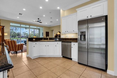 Stunning Pool Home on the Water in PGA Village! Beautifully on The Legacy Golf and Tennis Club in Florida - for sale on GolfHomes.com, golf home, golf lot