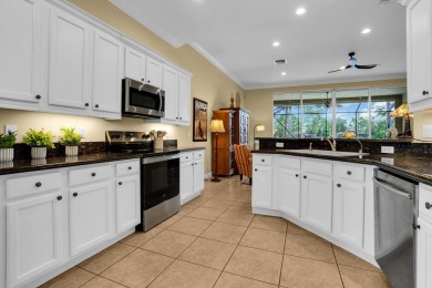 Stunning Pool Home on the Water in PGA Village! Beautifully on The Legacy Golf and Tennis Club in Florida - for sale on GolfHomes.com, golf home, golf lot