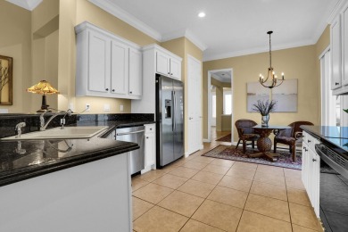 Stunning Pool Home on the Water in PGA Village! Beautifully on The Legacy Golf and Tennis Club in Florida - for sale on GolfHomes.com, golf home, golf lot
