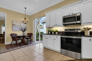 Stunning Pool Home on the Water in PGA Village! Beautifully on The Legacy Golf and Tennis Club in Florida - for sale on GolfHomes.com, golf home, golf lot