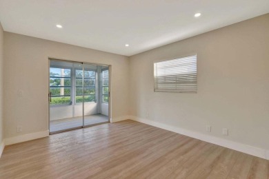 Discover the ultimate in luxury living at 802 Burgundy Q, a on Kings Point Golf -Flanders Way in Florida - for sale on GolfHomes.com, golf home, golf lot