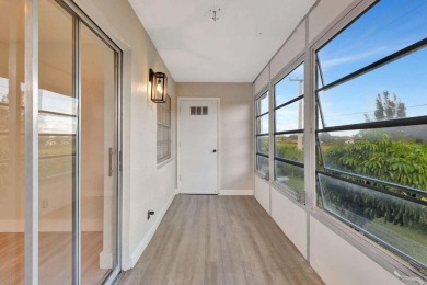Discover the ultimate in luxury living at 802 Burgundy Q, a on Kings Point Golf -Flanders Way in Florida - for sale on GolfHomes.com, golf home, golf lot