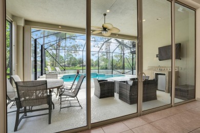 Stunning Pool Home on the Water in PGA Village! Beautifully on The Legacy Golf and Tennis Club in Florida - for sale on GolfHomes.com, golf home, golf lot