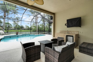 Stunning Pool Home on the Water in PGA Village! Beautifully on The Legacy Golf and Tennis Club in Florida - for sale on GolfHomes.com, golf home, golf lot