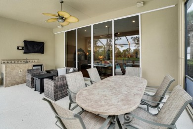 Stunning Pool Home on the Water in PGA Village! Beautifully on The Legacy Golf and Tennis Club in Florida - for sale on GolfHomes.com, golf home, golf lot