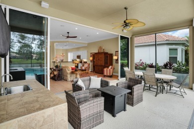 Stunning Pool Home on the Water in PGA Village! Beautifully on The Legacy Golf and Tennis Club in Florida - for sale on GolfHomes.com, golf home, golf lot