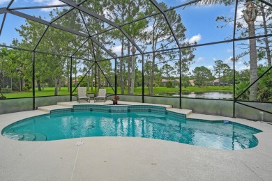 Stunning Pool Home on the Water in PGA Village! Beautifully on The Legacy Golf and Tennis Club in Florida - for sale on GolfHomes.com, golf home, golf lot
