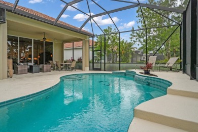 Stunning Pool Home on the Water in PGA Village! Beautifully on The Legacy Golf and Tennis Club in Florida - for sale on GolfHomes.com, golf home, golf lot