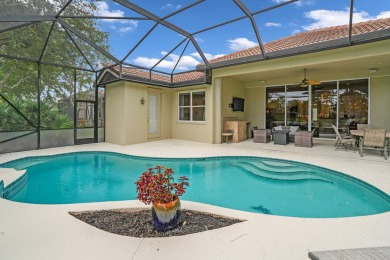 Stunning Pool Home on the Water in PGA Village! Beautifully on The Legacy Golf and Tennis Club in Florida - for sale on GolfHomes.com, golf home, golf lot