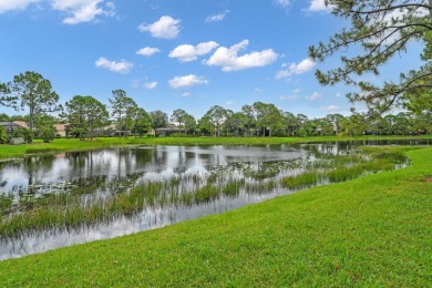 Stunning Pool Home on the Water in PGA Village! Beautifully on The Legacy Golf and Tennis Club in Florida - for sale on GolfHomes.com, golf home, golf lot