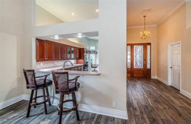 Trying to downsize but don't want to feel cramped? Step into the on East Lake Woodlands Country Club in Florida - for sale on GolfHomes.com, golf home, golf lot