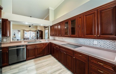 Trying to downsize but don't want to feel cramped? Step into the on East Lake Woodlands Country Club in Florida - for sale on GolfHomes.com, golf home, golf lot
