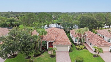 Stunning Pool Home on the Water in PGA Village! Beautifully on The Legacy Golf and Tennis Club in Florida - for sale on GolfHomes.com, golf home, golf lot