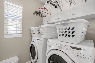 Nestled behind the gates of the coveted Market Street Community on Glen Ivy Golf Club in California - for sale on GolfHomes.com, golf home, golf lot