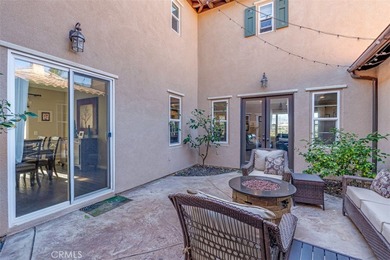 Nestled behind the gates of the coveted Market Street Community on Glen Ivy Golf Club in California - for sale on GolfHomes.com, golf home, golf lot