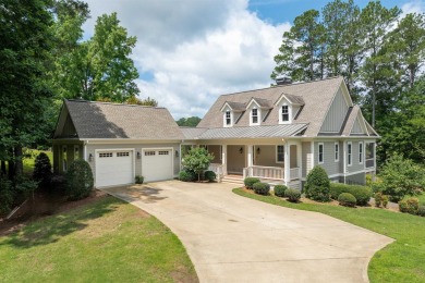 Charming 4-bedroom, 3.5-bath cottage-style home located in The on Reynolds Lake Oconee - The Landing in Georgia - for sale on GolfHomes.com, golf home, golf lot