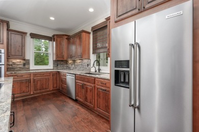 Charming 4-bedroom, 3.5-bath cottage-style home located in The on Reynolds Lake Oconee - The Landing in Georgia - for sale on GolfHomes.com, golf home, golf lot